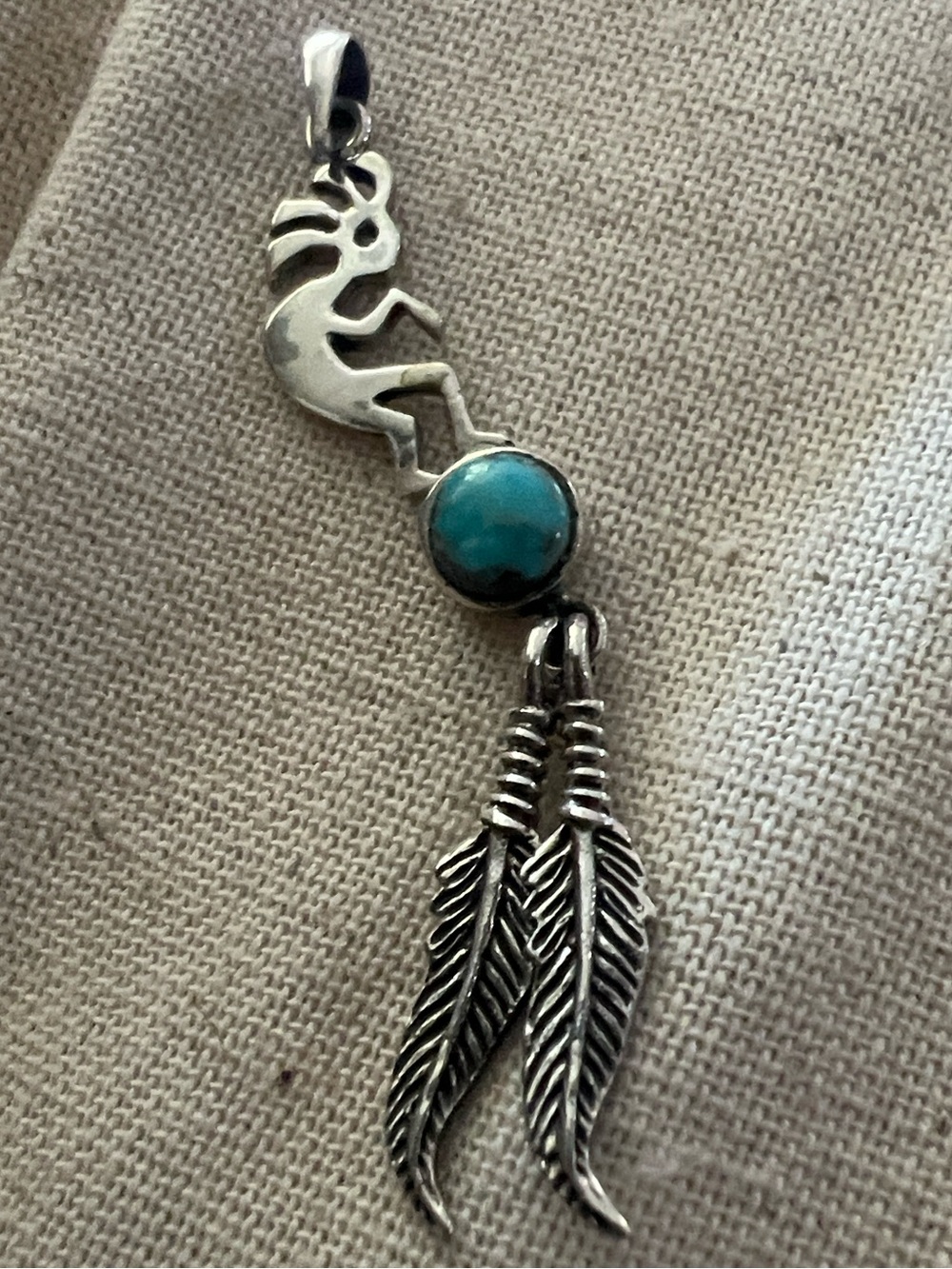Sterling Silver Kokopelli Genuine Turquoise Pendant with Feather Charms